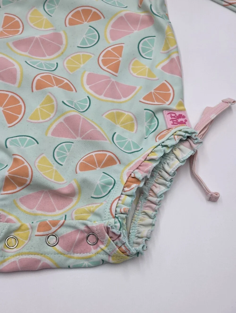 Ruffle Butts baby girl fruit print rashguard swimsuit size 12-18 months